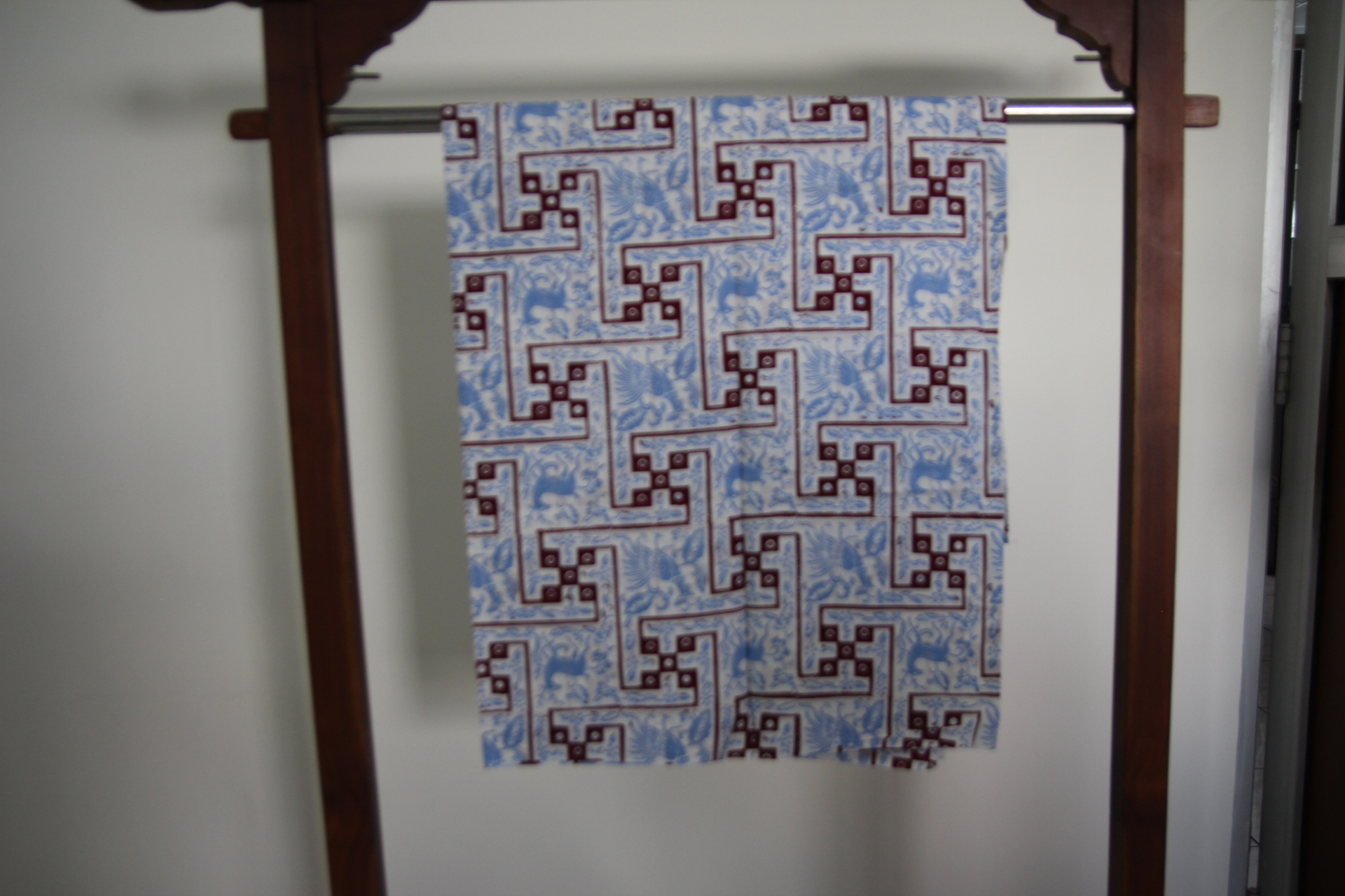 Kain cap biru langit